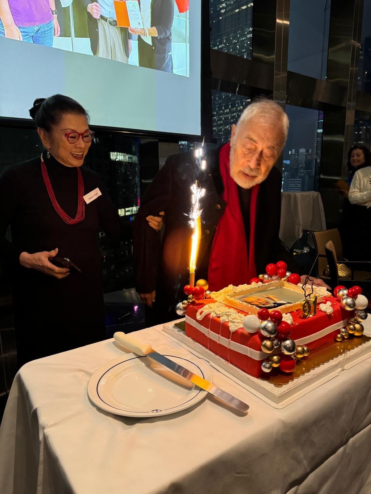 Henry Steiner beside a birthday cake at his ninety-first birthday celebration