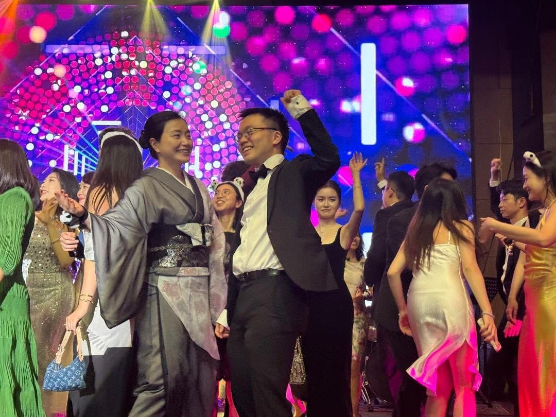Yale alumni dancing at the Ivy Ball in Hong Kong